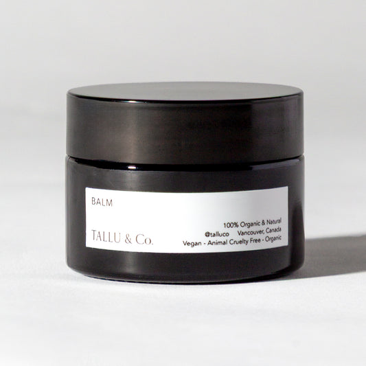 Front view of Tallu Nourishing Balm, an all-purpose organic balm for lips and skin.